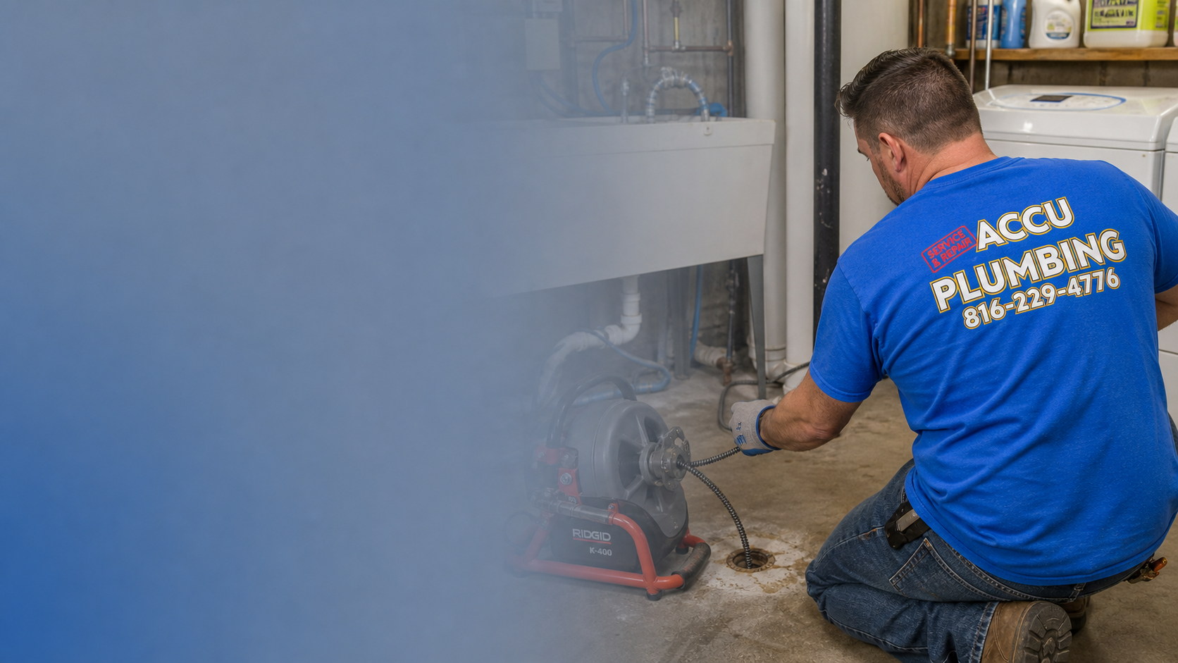ACCU Plumbing technician cleaning a basement drain